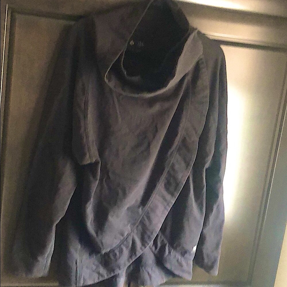Oversize jacket with funnel neck and cross over snap close